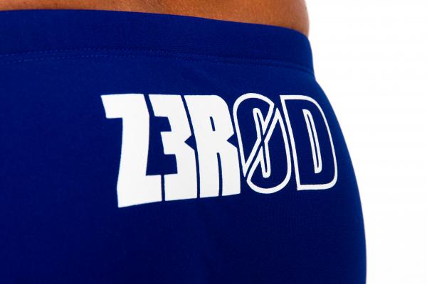 Man dark blue atoll orange swim trunks | Z3R0D